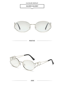 Detail view of Y2K oval sunglasses with hollow heart-shaped silver metal temples
