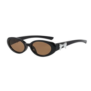 Lunettes de soleil ovales œil-de-chat avec nœuds argentés et monture noire pour femmes