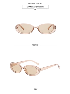 Detail view of oval champagne sunglasses showing front and side perspectives