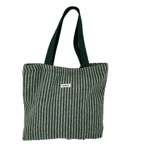 Green and cream herringbone wool tote bag with ATRYG logo for commute and casual use