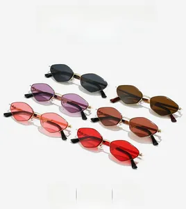 Set of irregular geometric sunglasses in black, purple, brown, pink, tea, and red colors