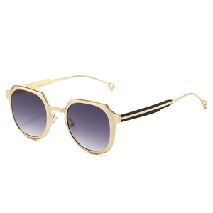 Retro geometric sunglasses with gold metal frame and purple gradient lenses for women