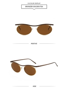 Détail de lunettes steampunk avec monture ondulée en bronze et verres de couleur thé