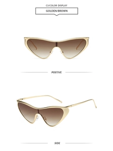 Detail of trendy one-piece cat-eye sunglasses with gold metal frame and brown lenses