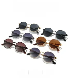 Detailed collection of vintage oval metal sunglasses in gold silver and black frames