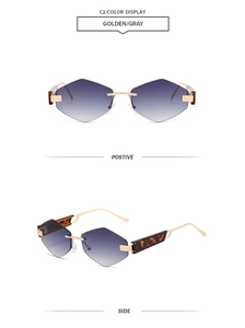 Close-up of rimless geometric sunglasses with purple gradient lenses and gold temples