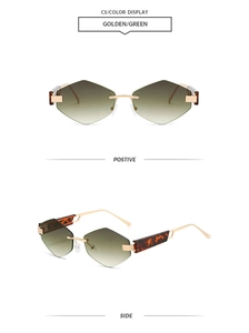 Detail view of rimless diamond-cut green gradient sunglasses with gold metal temples