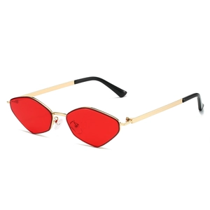 Irregular polygon sunglasses with red diamond lenses and slim gold metal frame