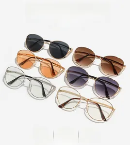 Close-up of metal frame sunglasses with refined chain link details on temples
