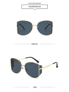 Detailansicht der goldenen Metallbügel und schwarzen Gläser dieser Cat-Eye-Sonnenbrille