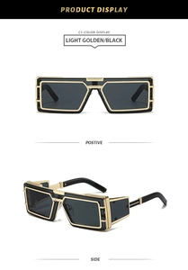 Detail view of steampunk punk sunglasses with metallic gold hollow frame and black lenses