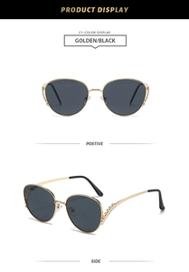 Detail of oversized metal frame sunglasses with diamond accents and gold-tone temples