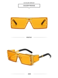 Detail view of golden metal square sunglasses with vintage orange translucent lenses
