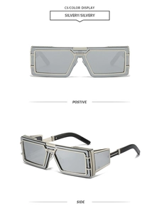 Macro detail of silver metal square steampunk sunglasses with hollow lattice frames