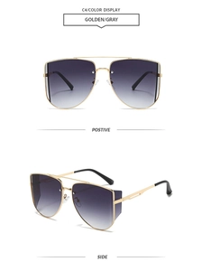 Detail view of double bridge golden metal aviator sunglasses with gray gradient lenses
