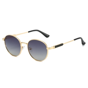 Retro oval sunglasses with golden metal frames and purple gradient lenses for women