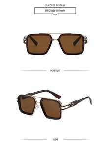 Detail view of double bridge sunglasses with brown lenses and golden metal accents