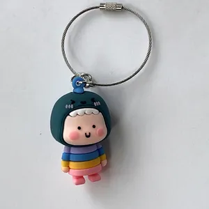 Cute cartoon girl in dinosaur hoodie keychain with rainbow shirt and steel wire ring