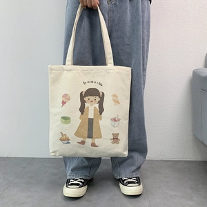 Canvas tote bag with cute cartoon illustrations and You are cute as a button text detail