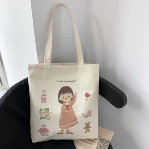 Detail of cute cartoon girl illustration on a minimalist off-white canvas tote bag