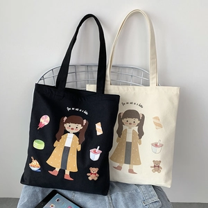 Detail of cute cartoon girls and donuts print on cotton canvas tote bag in two colors