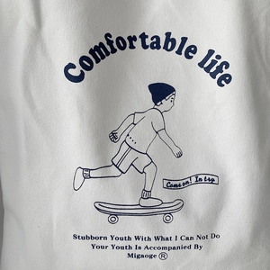 White canvas tote bag with skateboarder graphic print and comfortable life slogan
