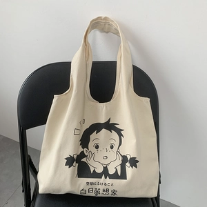 Détail du sac cabas en toile minimaliste avec illustration de dessin animé créative