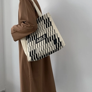 Large canvas tote bag with ABLE print and black geometric pattern for daily use