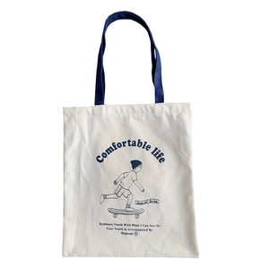 Thickened canvas tote bag with skateboard illustration and blue ribbon handles