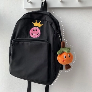 Black canvas backpack with Honey embroidery and cute orange plush orange pendant charm