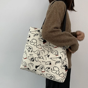Canvas tote bag for students with cartoon dog print and large capacity shoulder straps