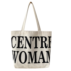 Minimalist large canvas tote bag with black CENTRE WOMAN text print on white background