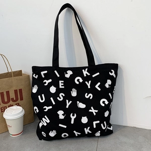 Large black canvas tote bag with Snoopy silhouette and letter print for daily travel