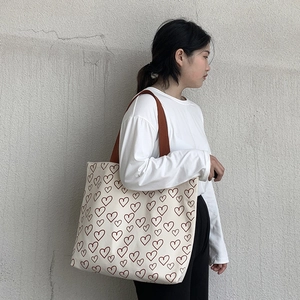 Japanese style canvas tote bag with brown heart patterns and large storage capacity