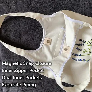 White lavender canvas tote bag with magnetic closure, inner zipper pocket, and dual compartments