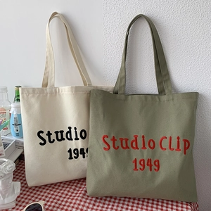 Detail of Studio Clip 1949 embroidery on sturdy canvas tote bag with neat stitching