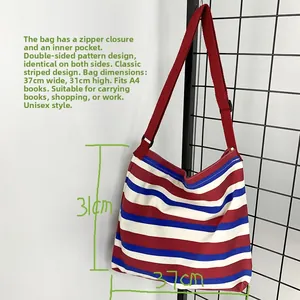 Detail of striped canvas tote showing 37x31cm dimensions and A4 size capacity