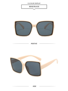 Detail of beige square frame sunglasses with quilted texture temples and black lens trim