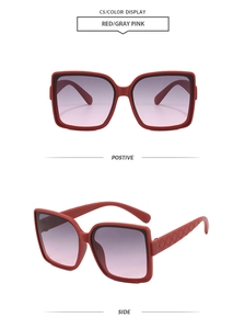 Detail of red square oversized sunglasses with diamond texture temples and gradient lenses