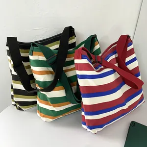 Three striped canvas tote bags with adjustable wide straps for casual daily usage