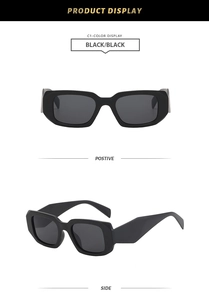 Vue détaillée de lunettes de soleil carrées vintage noires avec branches larges et verres UV