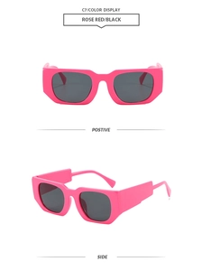 Detail of rose red thick frame rectangle sunglasses with black lenses and wide temples