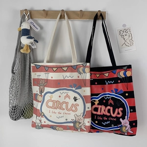 Cute circus themed canvas tote bag with red stripes and cartoon rabbit patterns