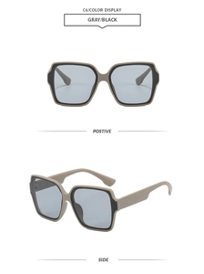 Detail view of square oversized sunglasses with two-tone frame and gray lenses
