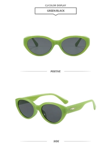 Grüne Cat-Eye-Sonnenbrille mit schwarzen Gläsern und silbernen Details, Vorder- und Seitenansicht
