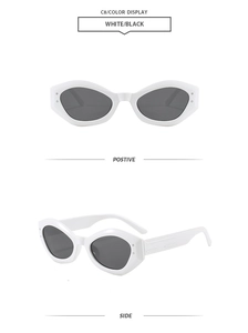 Front and side views of stylish white cat-eye sunglasses with dark grey lenses