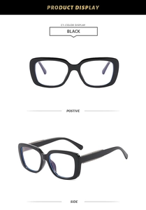 Detail view of black square frame glasses with silver metal chain decor on temples