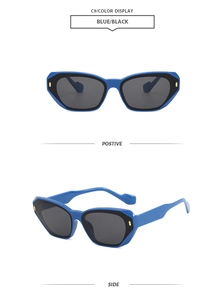 Detail view of stylish blue square sunglasses with gold metal accents and black lenses