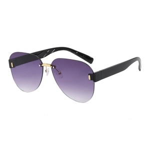 Fashionable rimless aviator sunglasses with purple gradient lenses and gold bridge