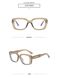 Detail of olive green square frame glasses with stylish metal chain on the temples